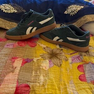 Reebok women's Dark Green Suede Sneakers with White Stripes and Gum Sole